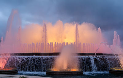 Colorful performance of magic fountain of montjuic in barcelona, spain.