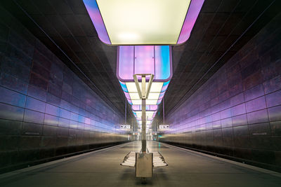 Illuminated lights on railroad station platform