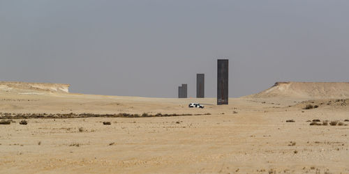 Scenic view of desert against clear sky