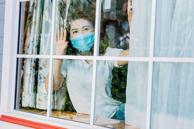 Asian woman quarantined at home to prevent the spread of the virus.