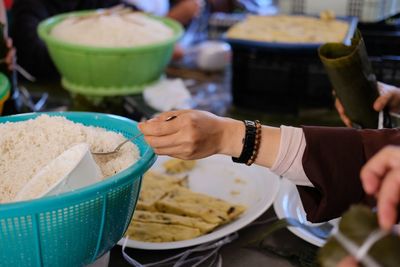 Close-up of person preparing food