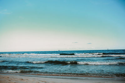 Scenic view of sea against clear sky