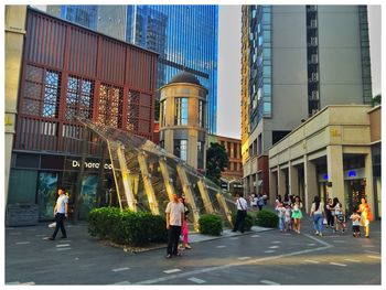 People walking on city street