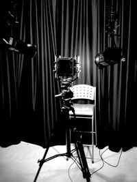 Light falling on empty chair in photo studio