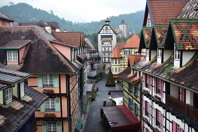 Houses against sky in city