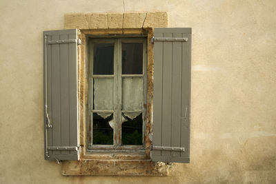 Closed window of old building