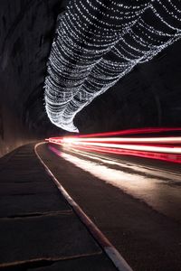 Light trails on road at night