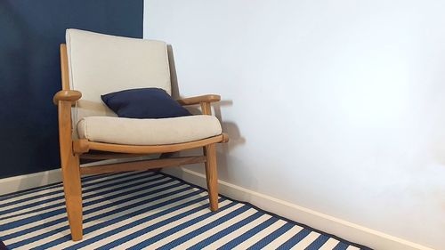 Empty sofa against wall