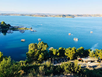 High angle view of sailboats in sea