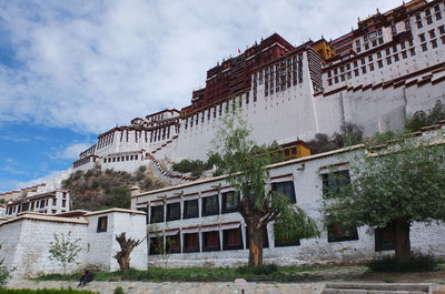 Low angle view of potala palace against sky