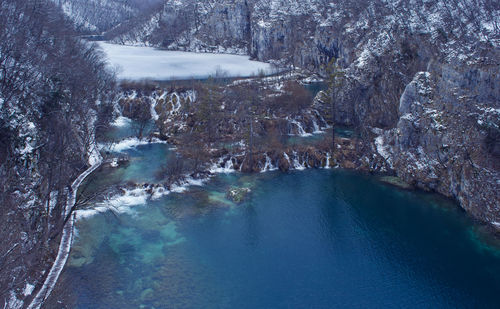 High angle view of snow on rocks