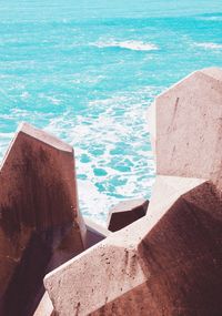 High angle view of swimming pool by sea against sky