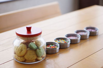 Close-up of cookies in jar on table