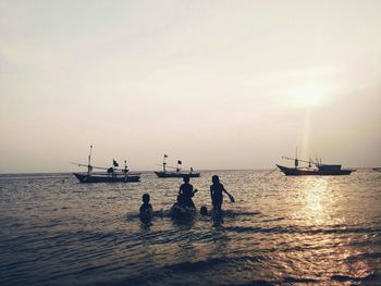 Scenic view of sea at sunset
