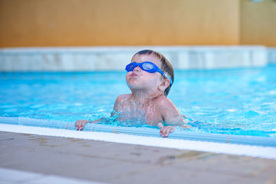 Close-up of boy in swimming pool