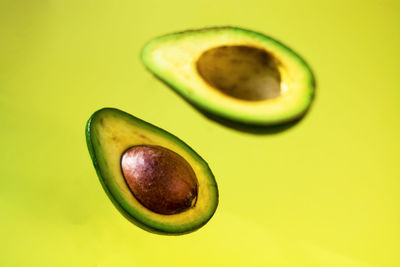 Close-up of fruit against green background