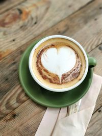 Close-up of cappuccino on table