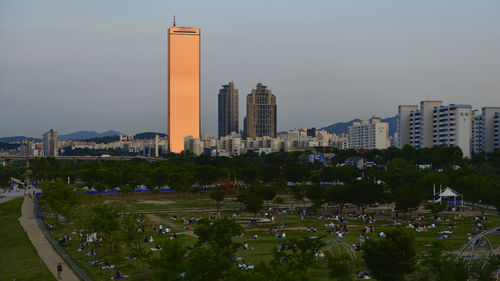 View of buildings in city against sky