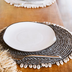 High angle view of wedding rings on table