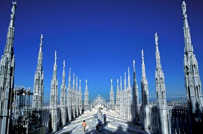 Panoramic view of road against clear blue sky