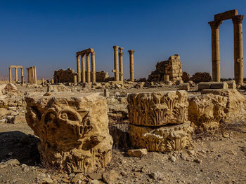 Antique ruins against sky