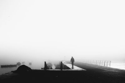 Scenic view of sea against sky in city