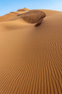 Sand dunes in desert