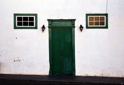 Closed door and window of building