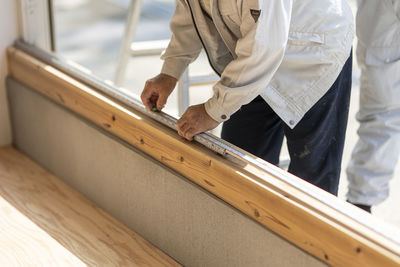 Midsection of man working at construction site
