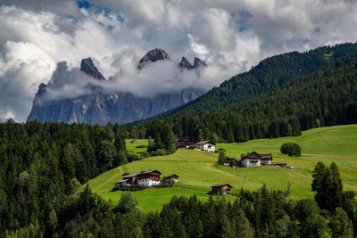 Scenic view of landscape and mountains against sky