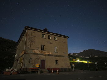 Low angle view of building against sky at night