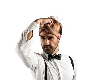 Portrait of young man against white background