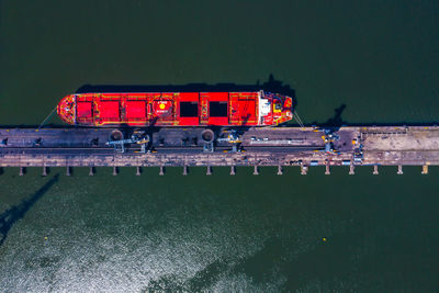 Container ship from sea port working for delivery containers shipment and container warehouse 