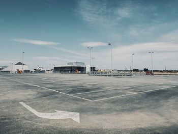 Empty parking lot against sky