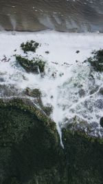 High angle view of water flowing through land