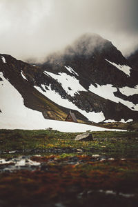 Beautiful lakeside cabin in the mountains of alaska on the hike crow pass in girdwood