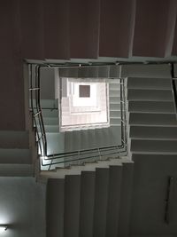 Low angle view of spiral staircase in building