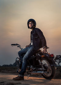 Portrait of young man riding motorcycle