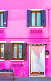 Multi colored windows of house