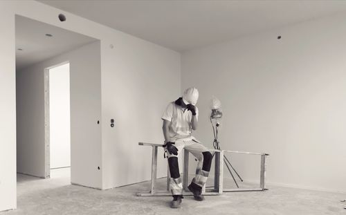 Man standing in corridor