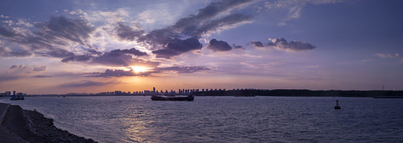 Scenic view of sea against sky during sunset