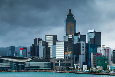 Modern buildings in city against sky