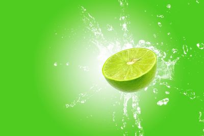 Green fruits on glass