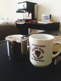 Close-up of coffee cup on table