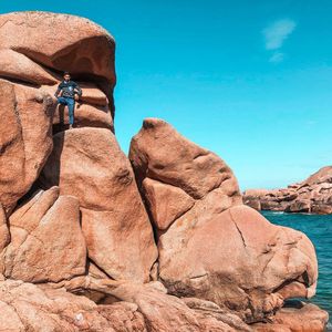 Rock formation in desert against clear blue sky