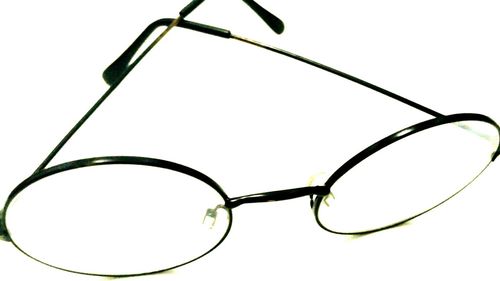 Close-up of eyeglasses against white background