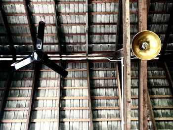 Low angle view of books on ceiling in library