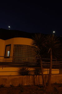 Low angle view of building against sky at night