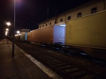 Train at railroad station at night