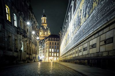 Illuminated buildings in city at night